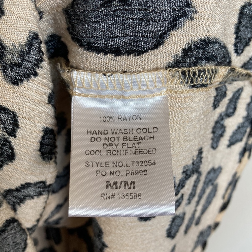 Main Strip Leopard Print Peplum Top - Picture 6 of 6